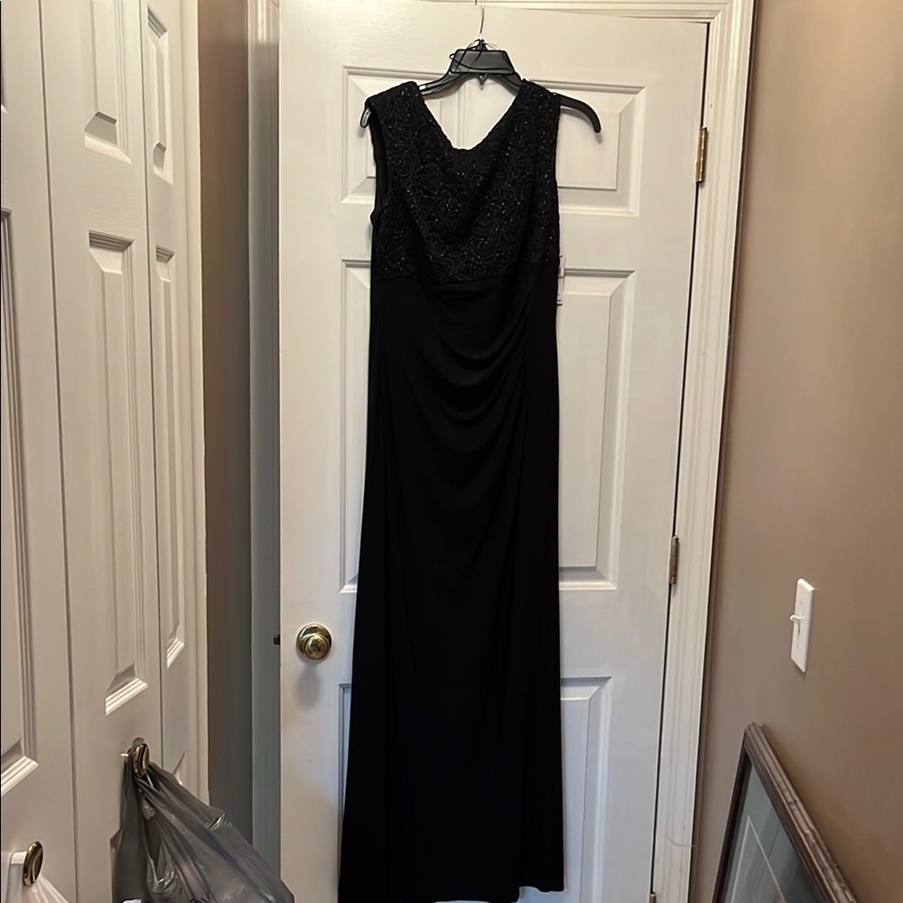 Elegant Black Evening Gown New with Tags. Size 12